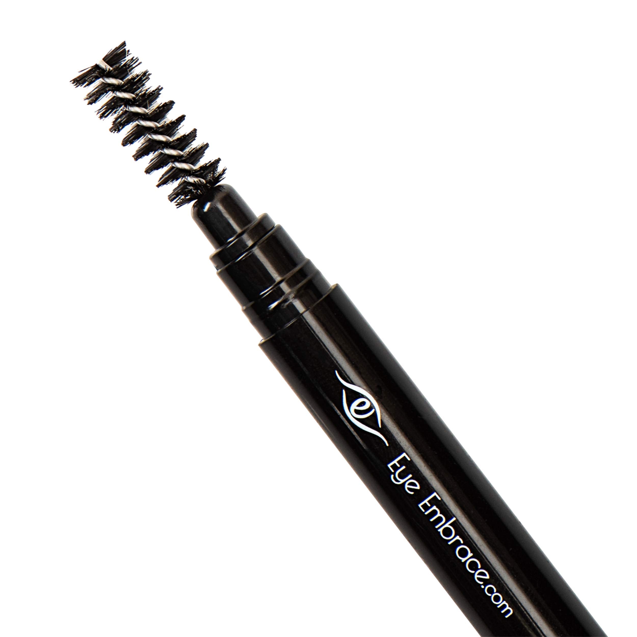 Eye Embrace pencil held in hand showing size and precise application control