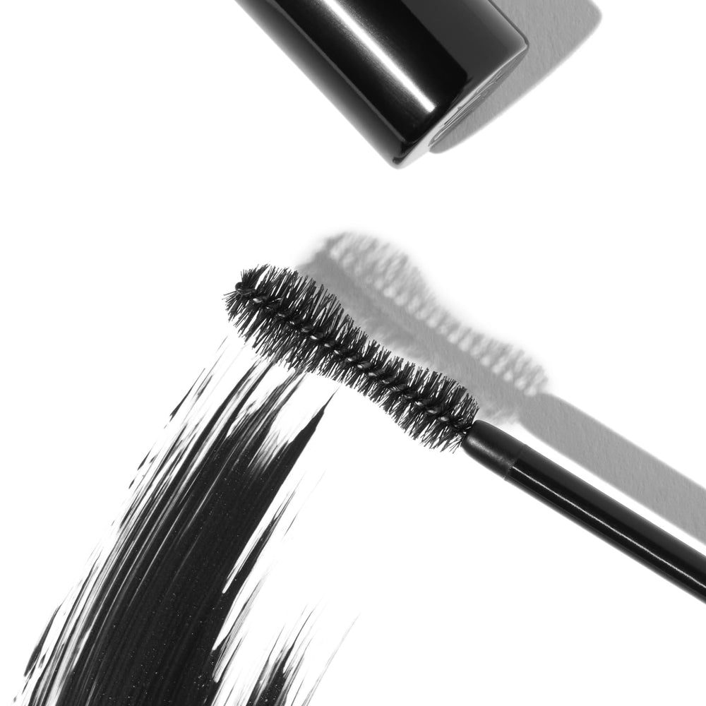 Eyeko guitar-shaped brush close-up highlighting lift and fanning benefit
