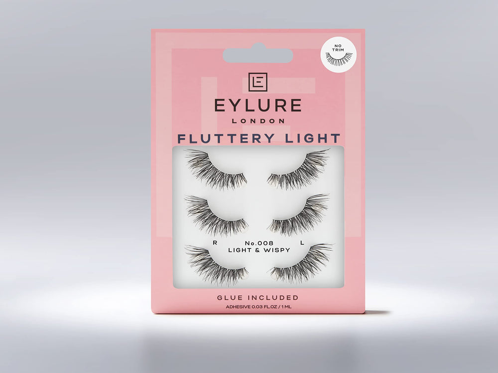Eylure lashes held in hand for scale showing compact size and travel-friendly benefit