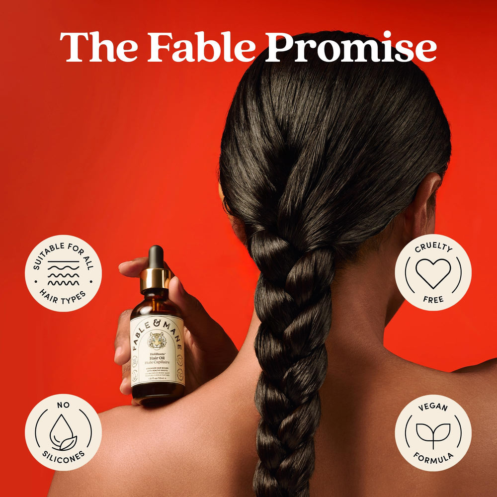 Fable & Mane applying HoliRoots to scalp demonstrating targeted nourishment