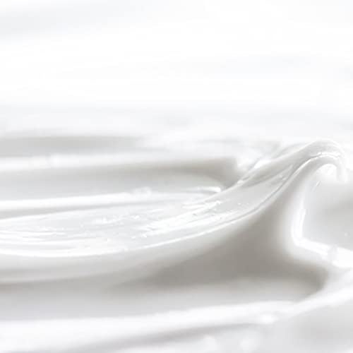 FAIR & WHITE label close-up showing AHA lactic acid ingredients