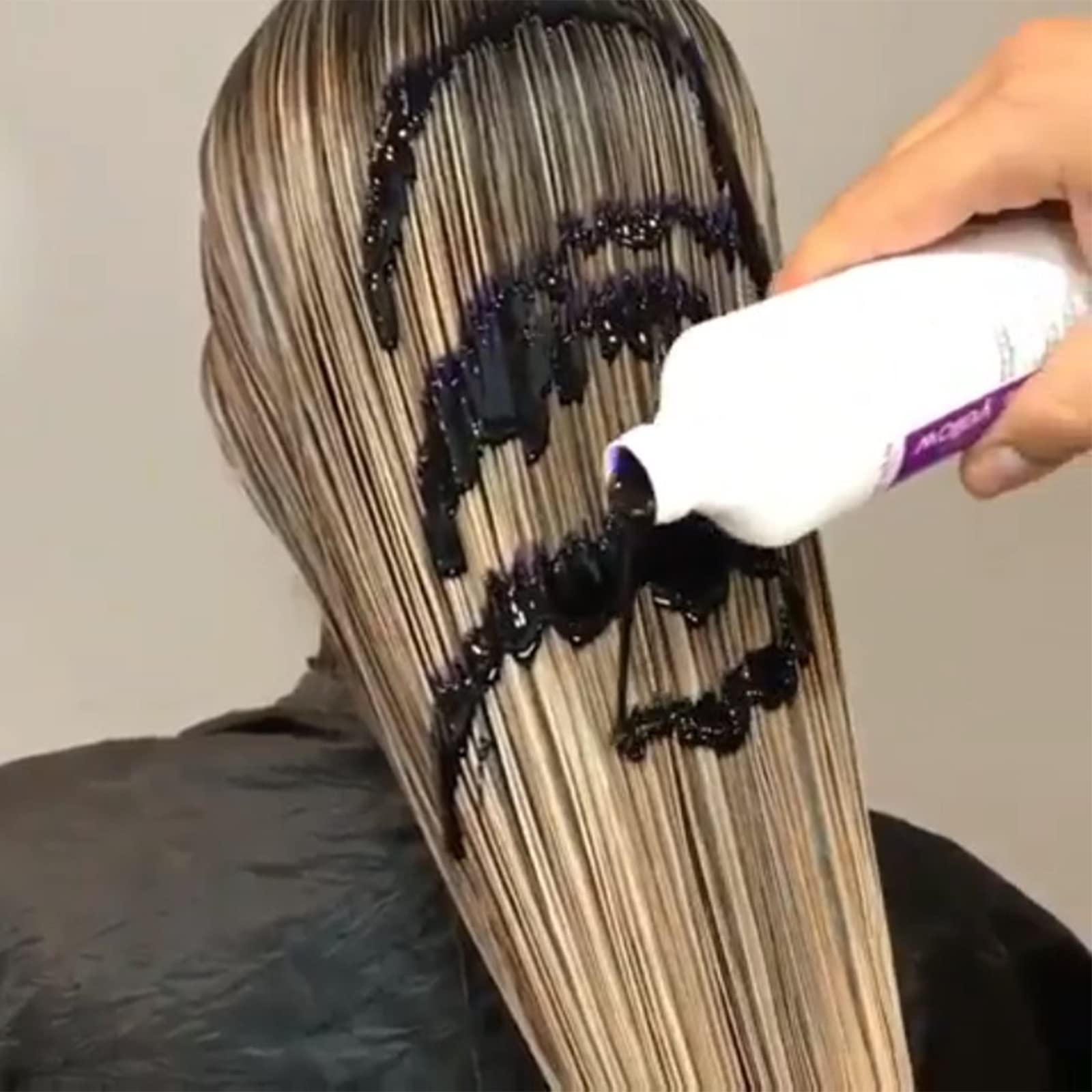 Fanola shampoo pouring into hand to show lather and gentle cleanse benefit