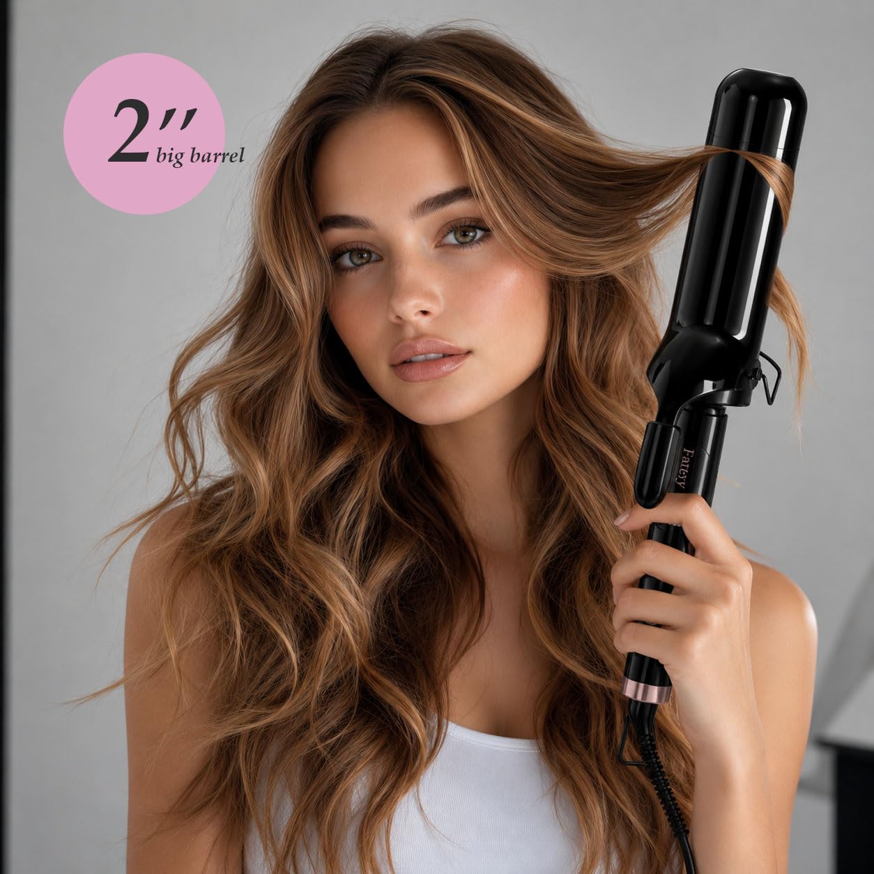 Farery close-up of ceramic barrel with argan oil and keratin finish for smoother, shinier hair