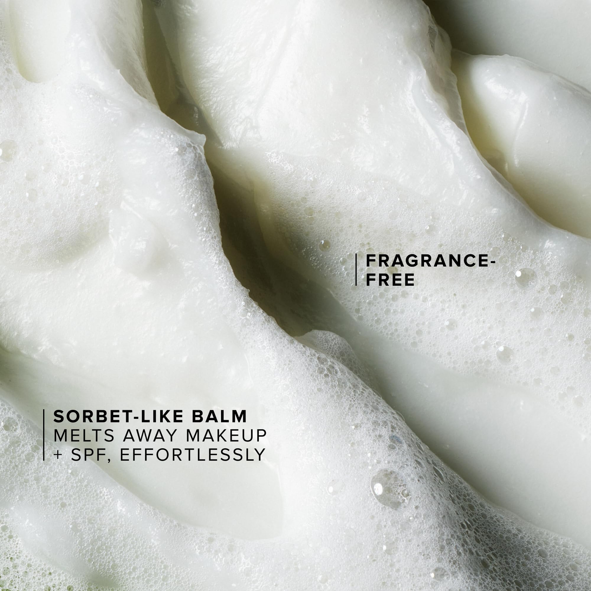 Farmacy cleansing balm held in hand to show 50ml size and easy application