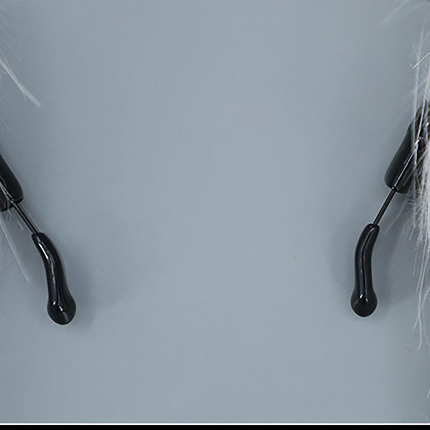 Faylay headband next to hand and ruler illustrating lightweight size