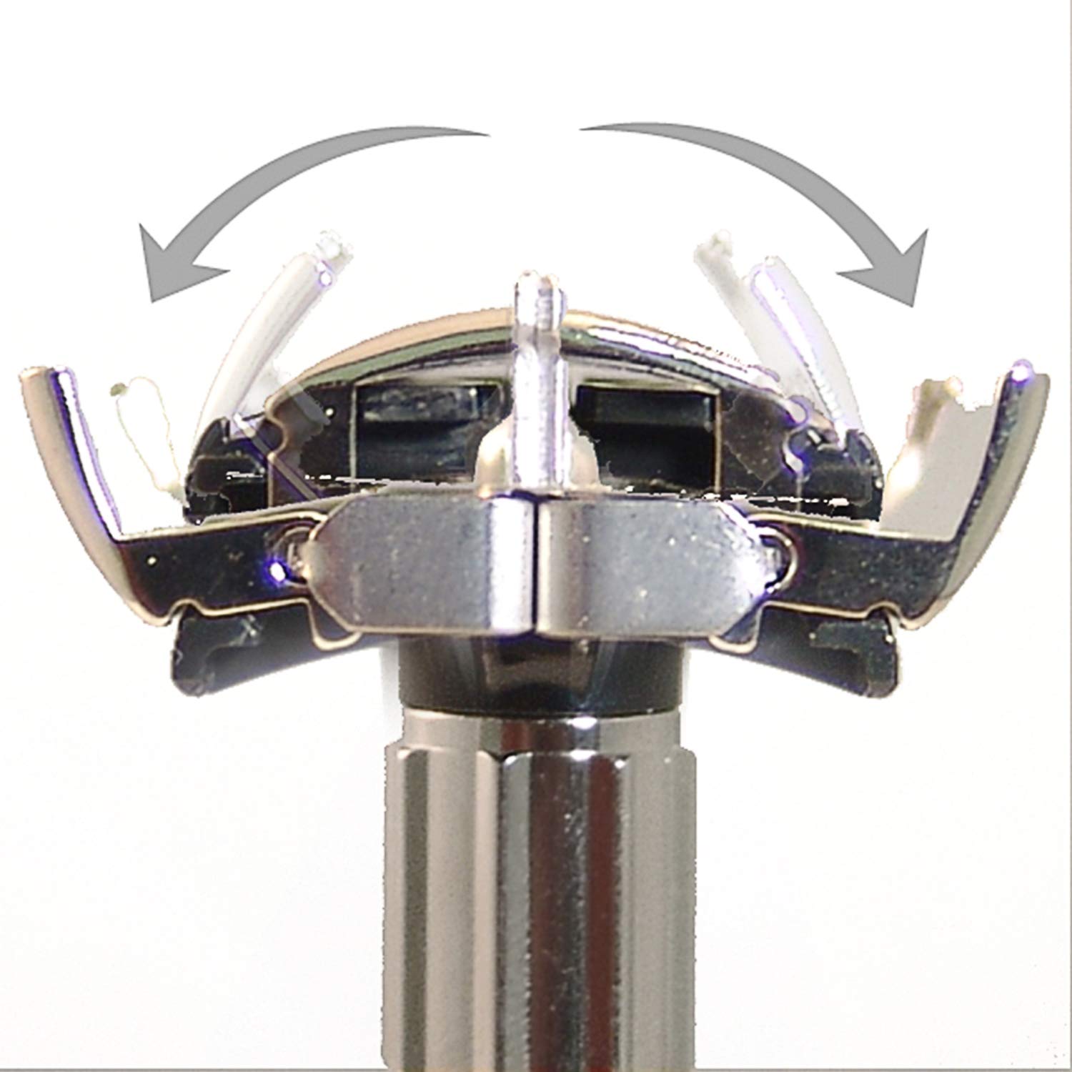 Feather butterfly opening mechanism displayed mid-twist for easy blade changes