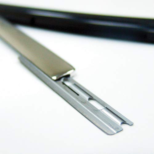 Feather blades staged at barber station illustrating professional-ready inventory