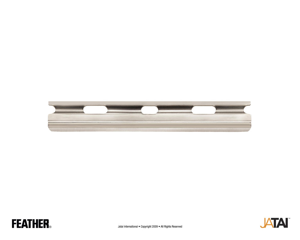 Feather blade beside ruler showing 57.7mm length for accurate sizing