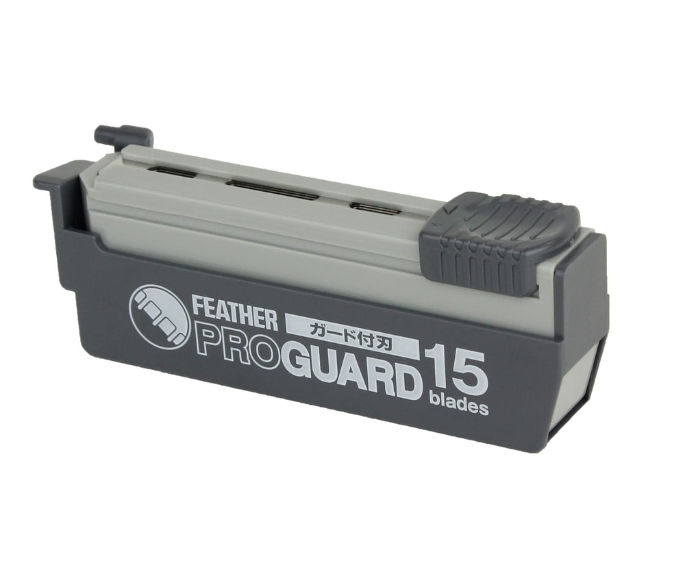 Feather ProGuard in barber setup showing professional precision and skin protection