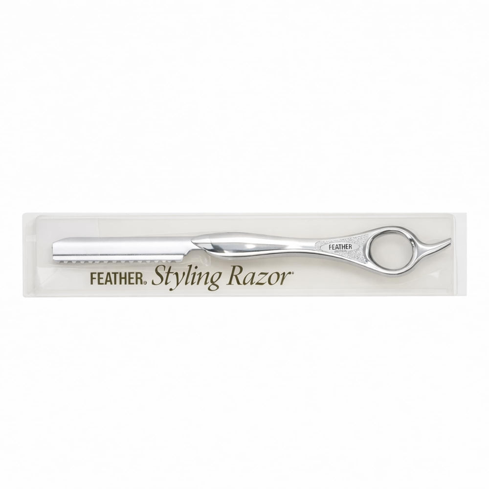 Feather silver handle front view showing sleek professional design and balance