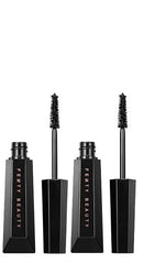 FENTY BEAUTY mascara held in hand to show scale and travel-ready size for convenient touch-ups