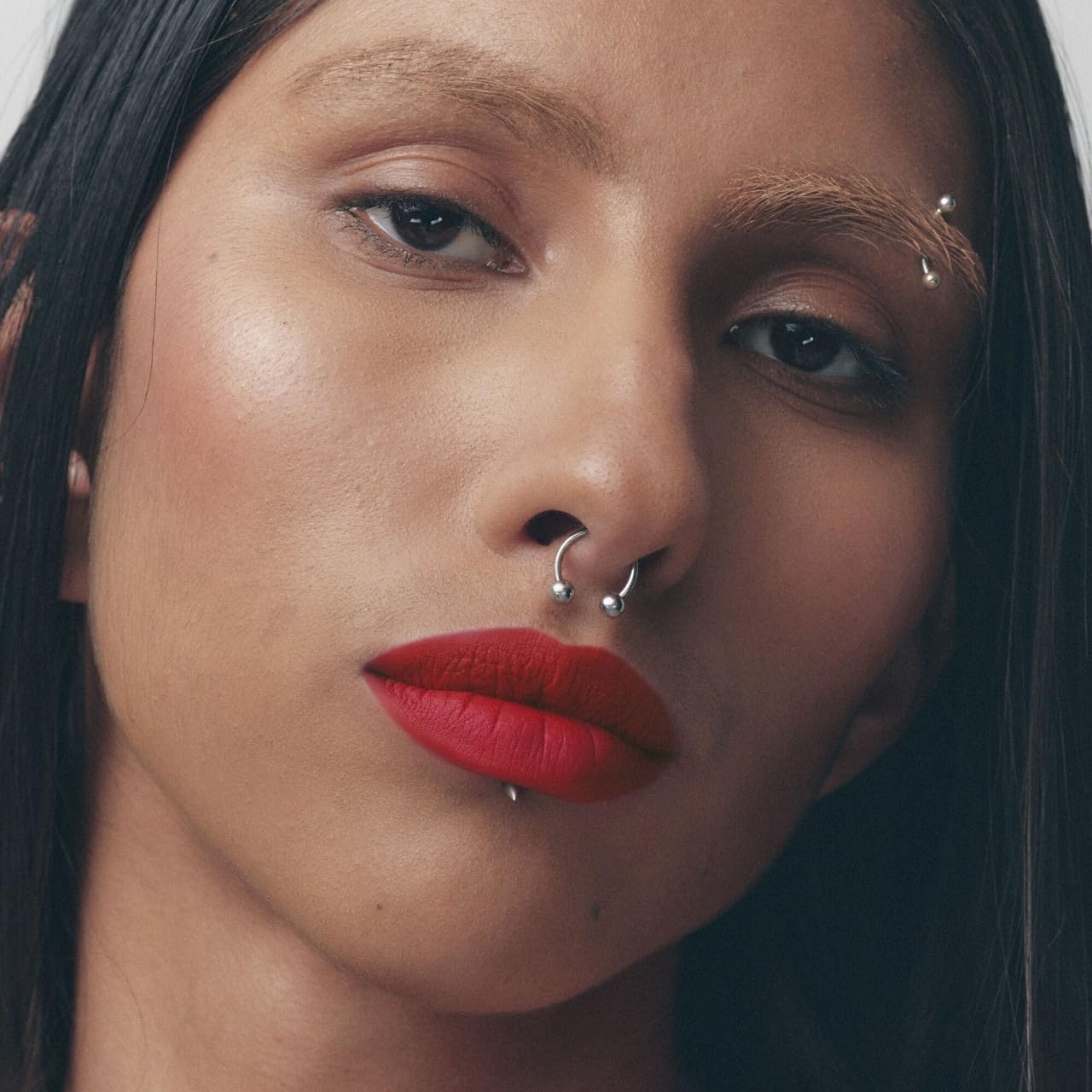 FENTY BEAUTY applied on lips showing velvety matte finish and comfortable wear look