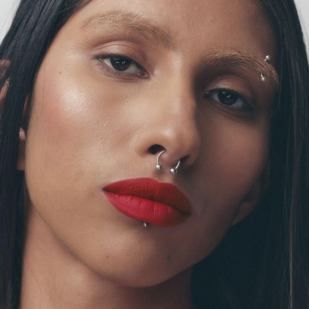 FENTY BEAUTY applied on lips showing velvety matte finish and comfortable wear look