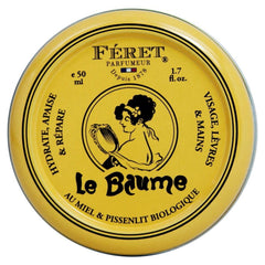 Feret Parfumeur front tin showing elegant rose-poudré packaging and portability