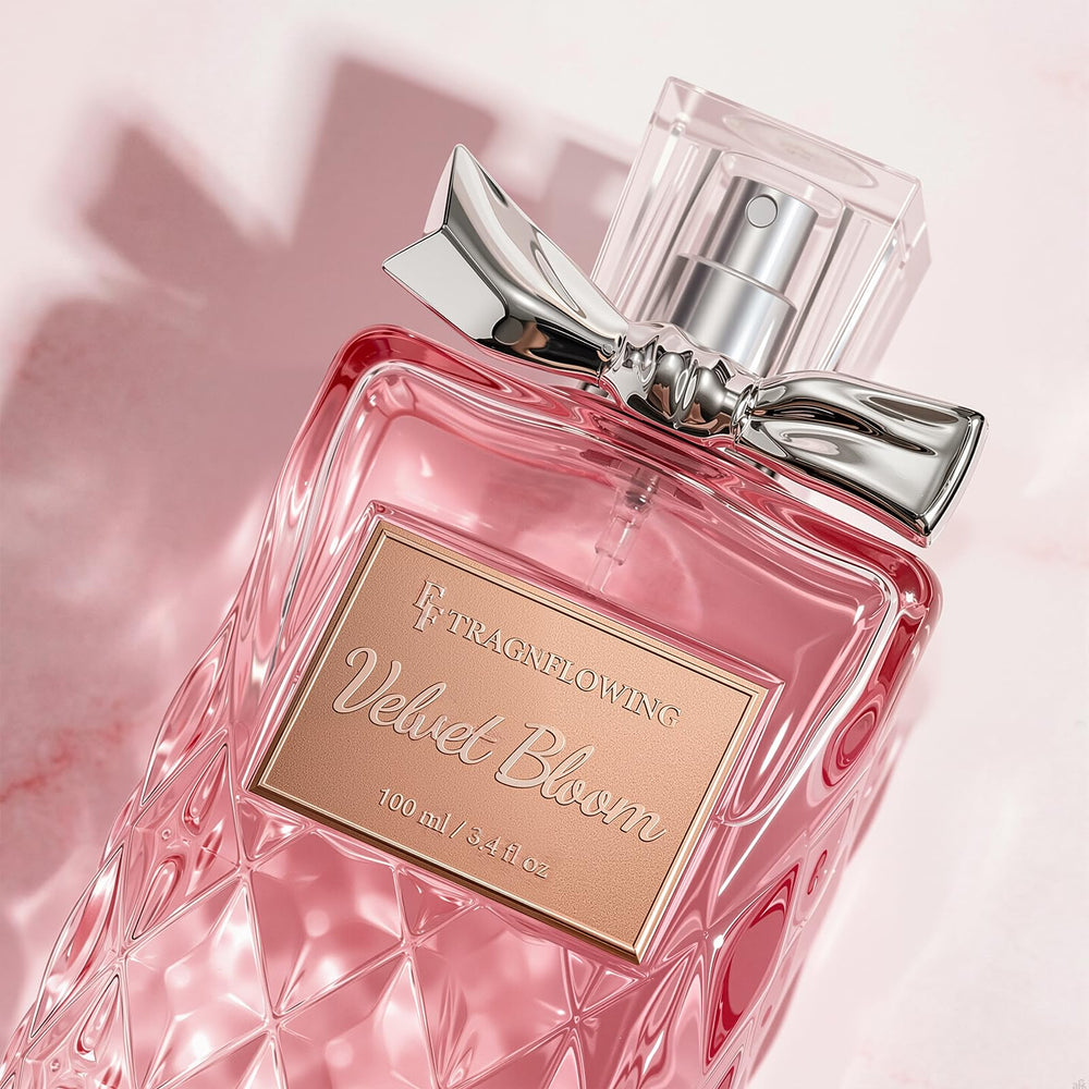 FF FRAGRFLOWING held in hand for scale showing compact 3.4 fl oz size advantage