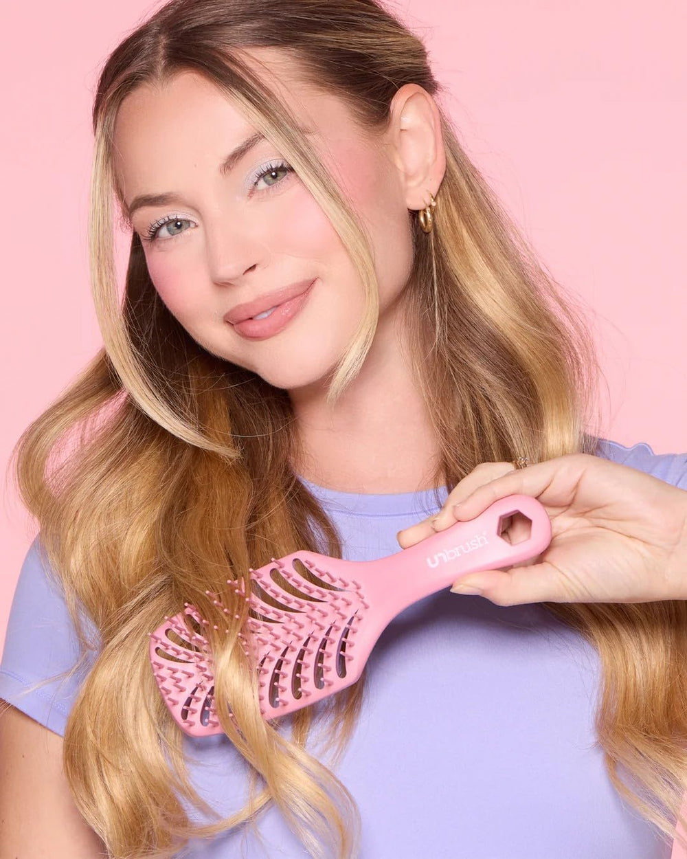 FHI Heat UNbrush packed in a travel bag for on-the-go styling convenience