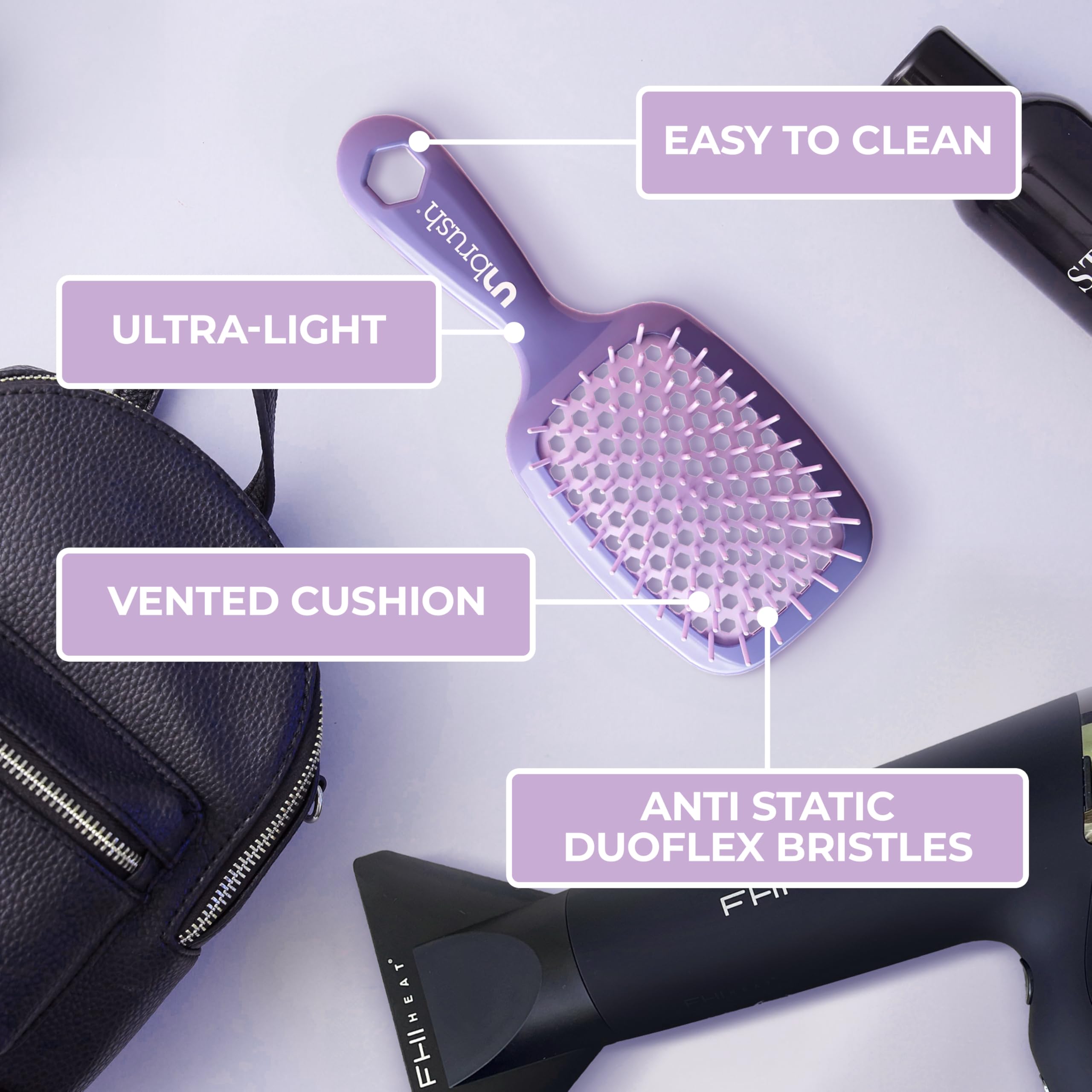 FHI Heat UNbrush detangling wet hair demonstrating gentle knot release without pain