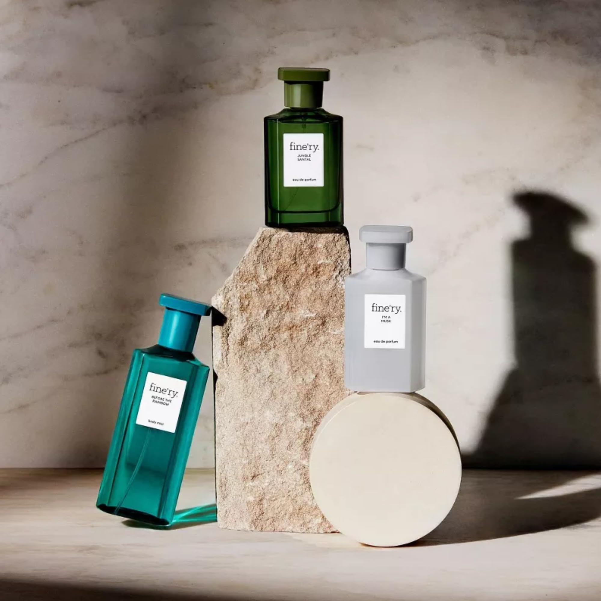 Fine'ry bottle in hand illustrating 60mL scale and travel-friendly size