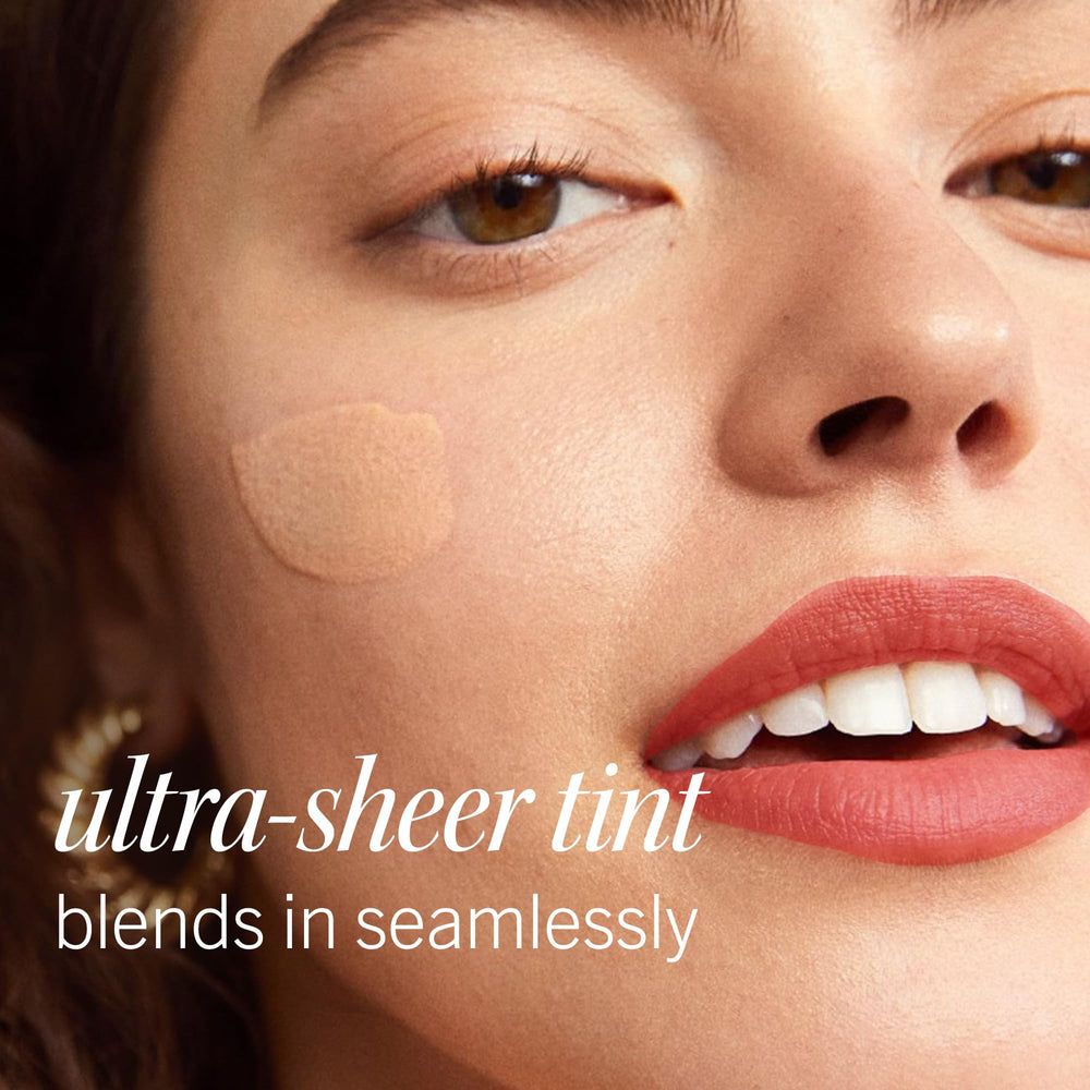 First Aid Beauty product styled with toiletries to show everyday routine benefit