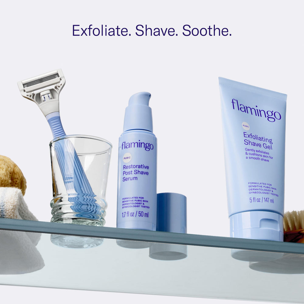 Flamingo pubic razor placed beside gel and serum to show compatibility and improved shaving results
