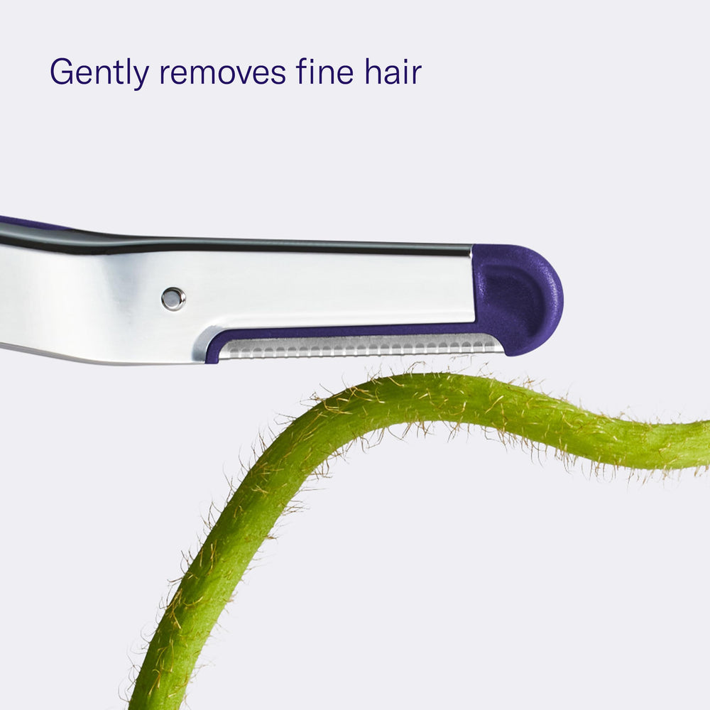 Flamingo blade pull-tab detail illustrating easy replacement and safe handling