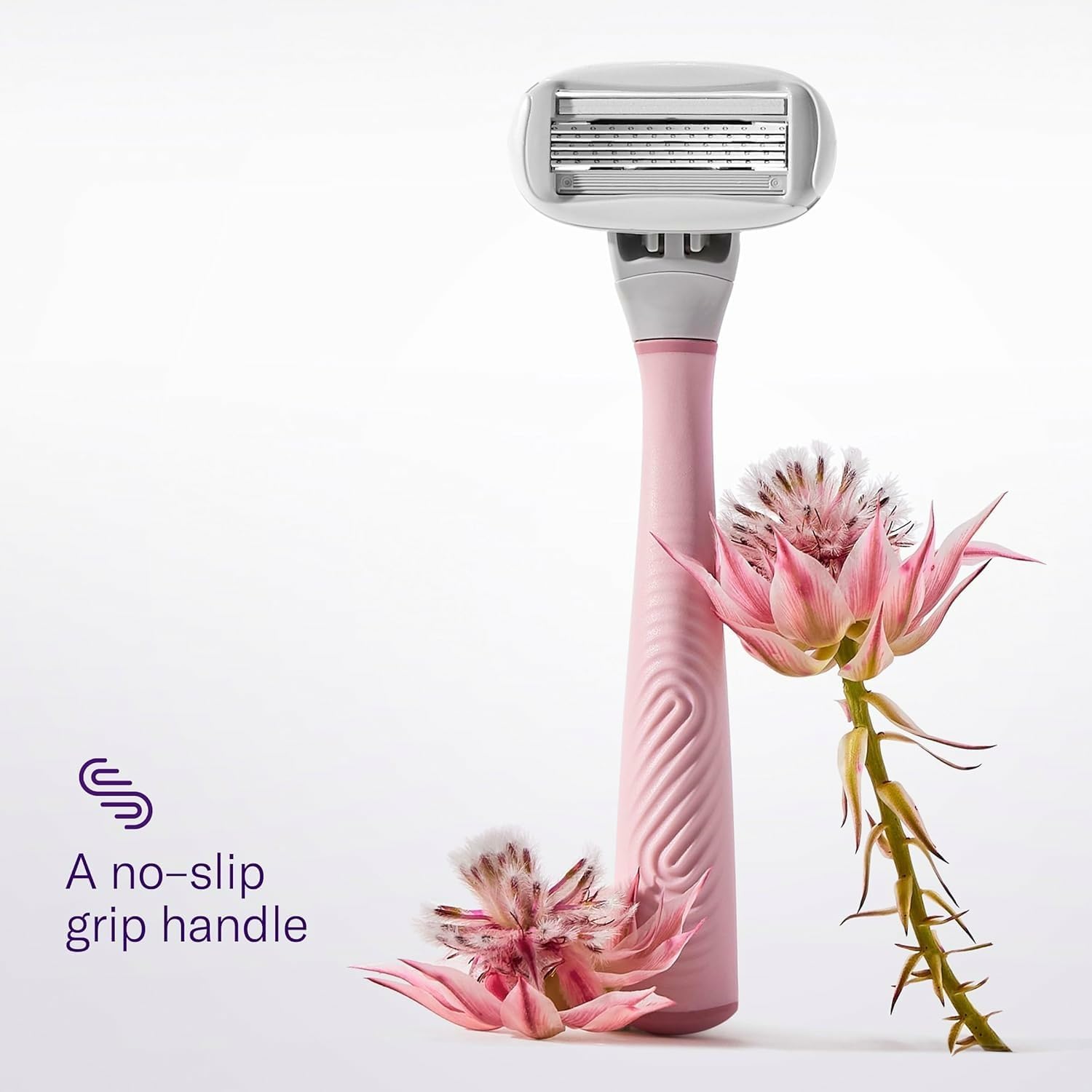 Flamingo handle texture grip detail offering no-slip wet hold benefit
