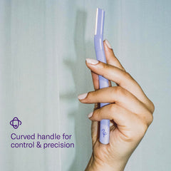 Flamingo razor in hand demonstrating gentle use and angle