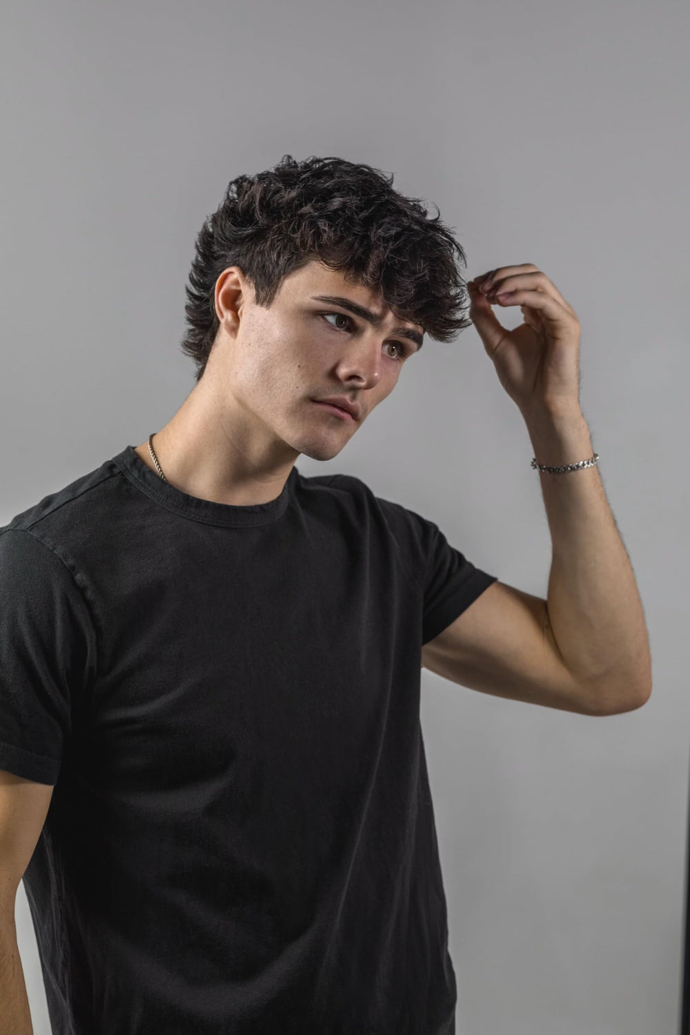 Flow Bros styled hair lifestyle shot showing textured volume benefit