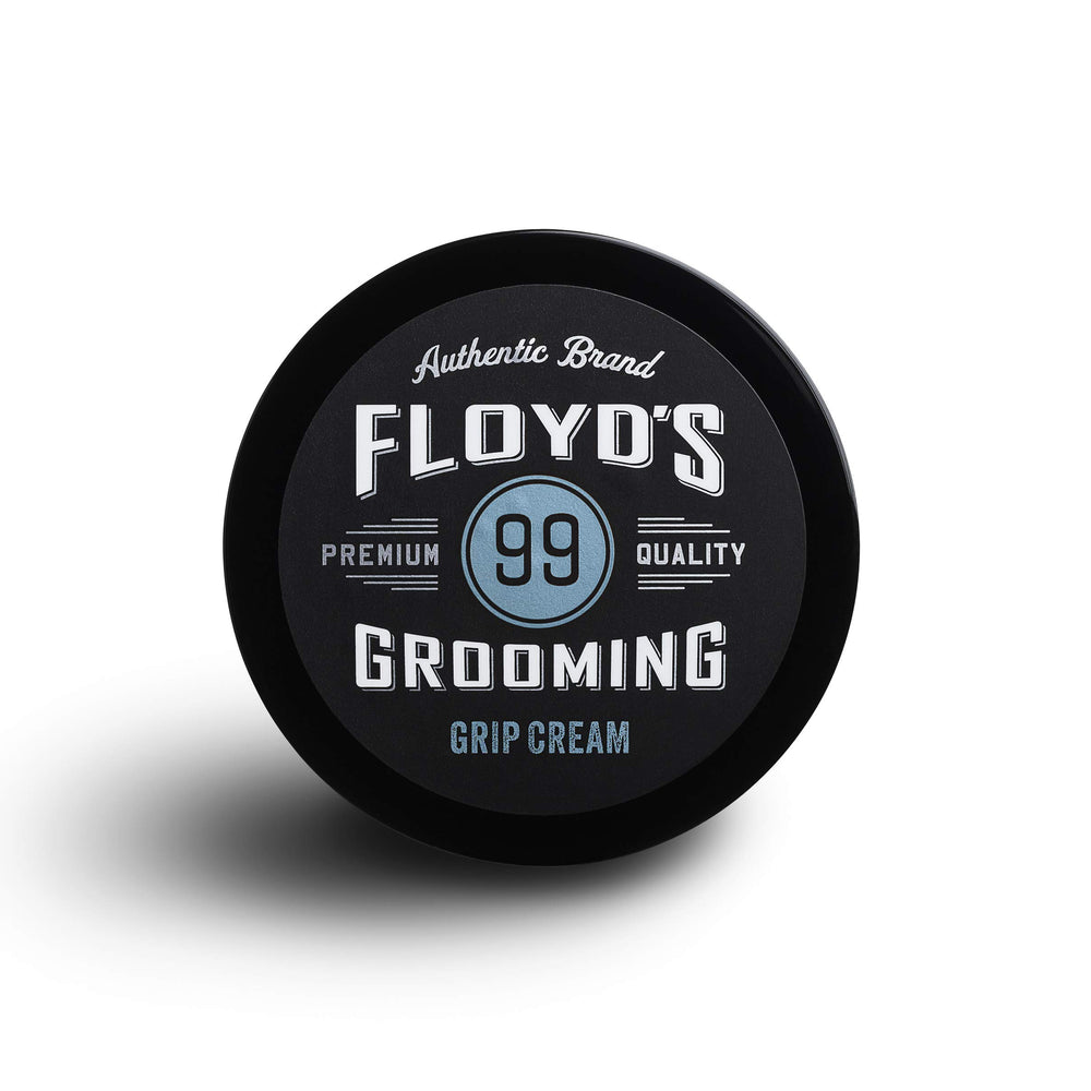 Floyd's 99 next to coin scale showing compact size for travel convenience