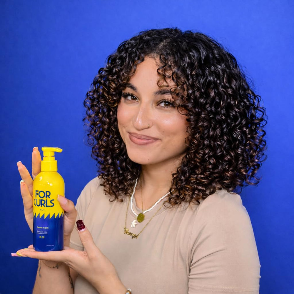 FOR HAIR bamboo stalks and jojoba seeds near product, emphasizes natural conditioning