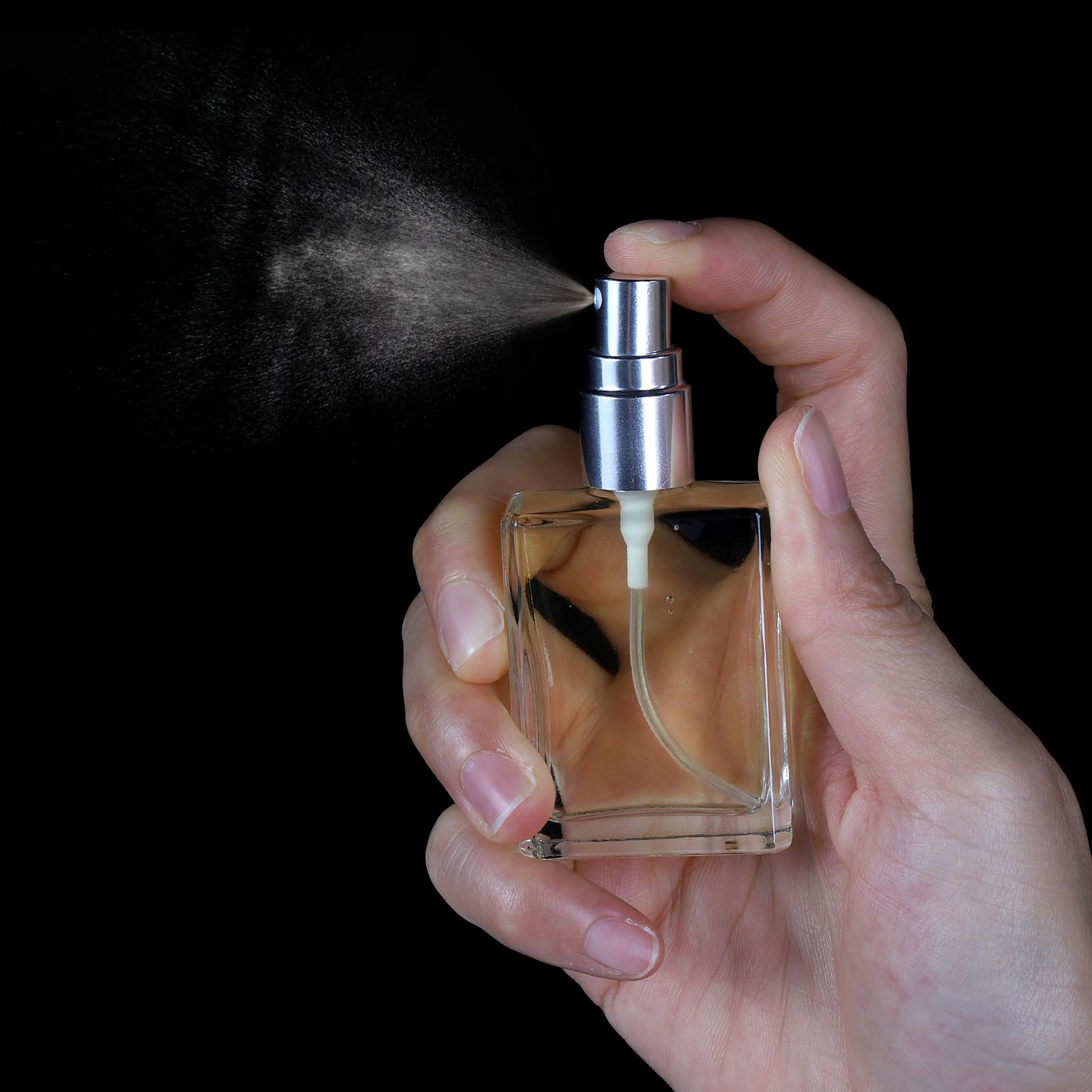 Foraineam 15ml bottle in hand to show size and easy pocket portability