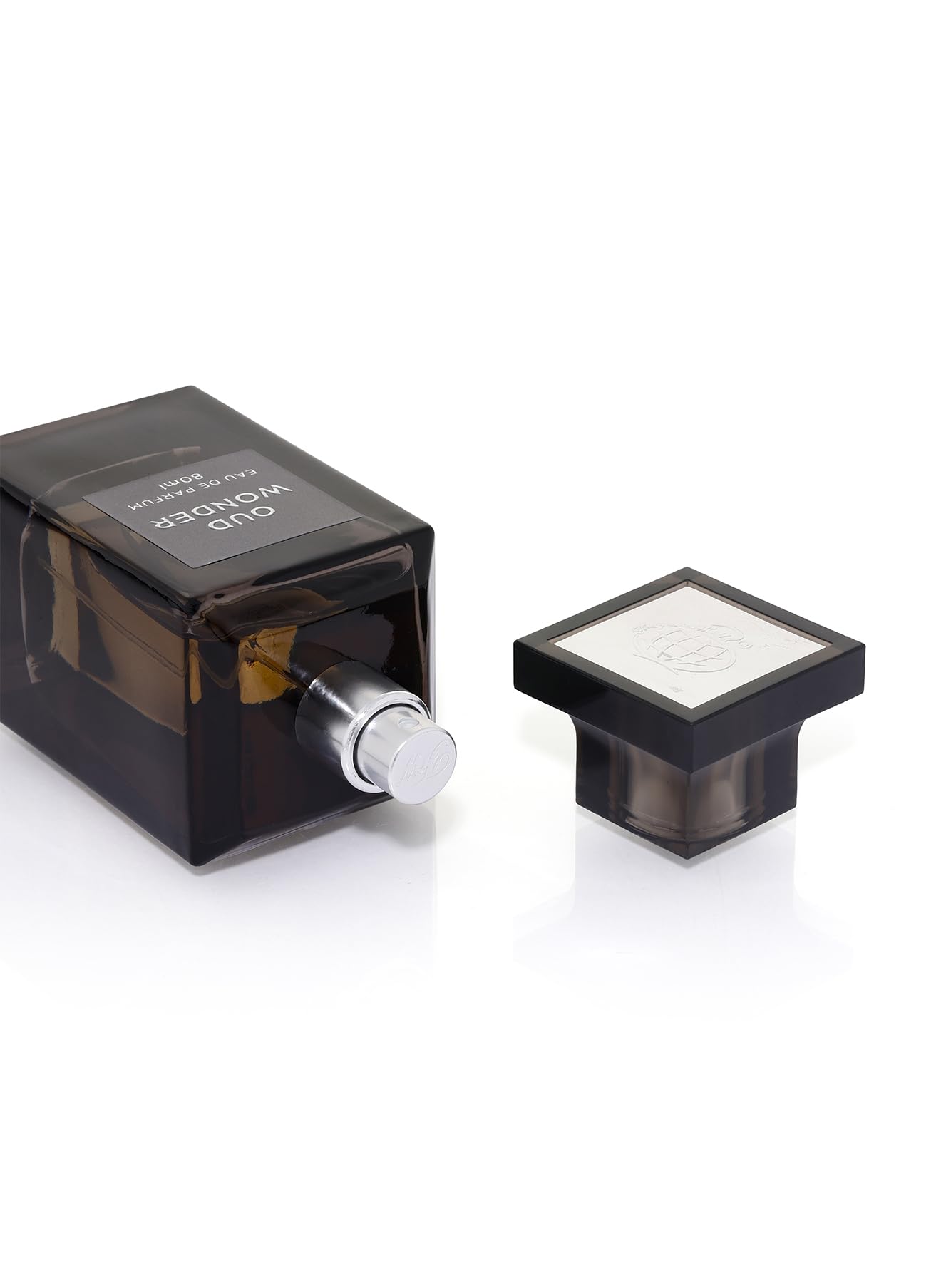 Fragrance World bottle detail closeup highlighting glass texture and luxury finish