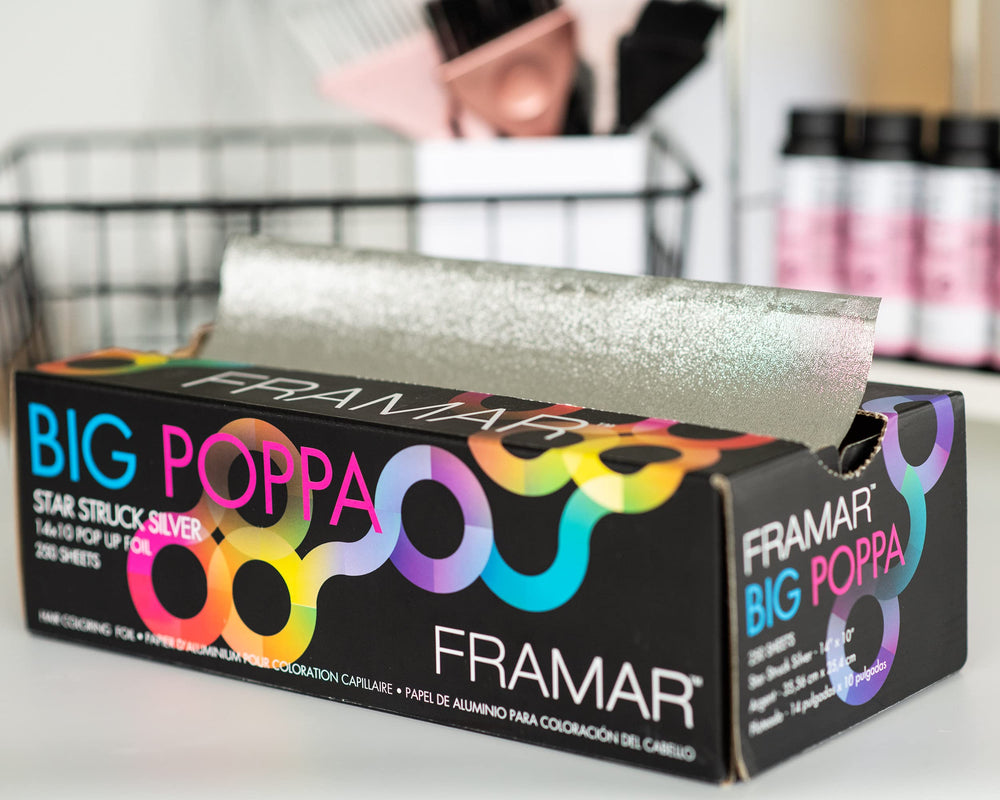 Framar foil held by hand to show 10x14 scale and easy handling benefit