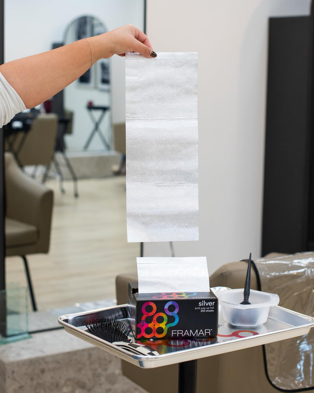 FRAMAR foils in use during full-head highlighting for efficient application