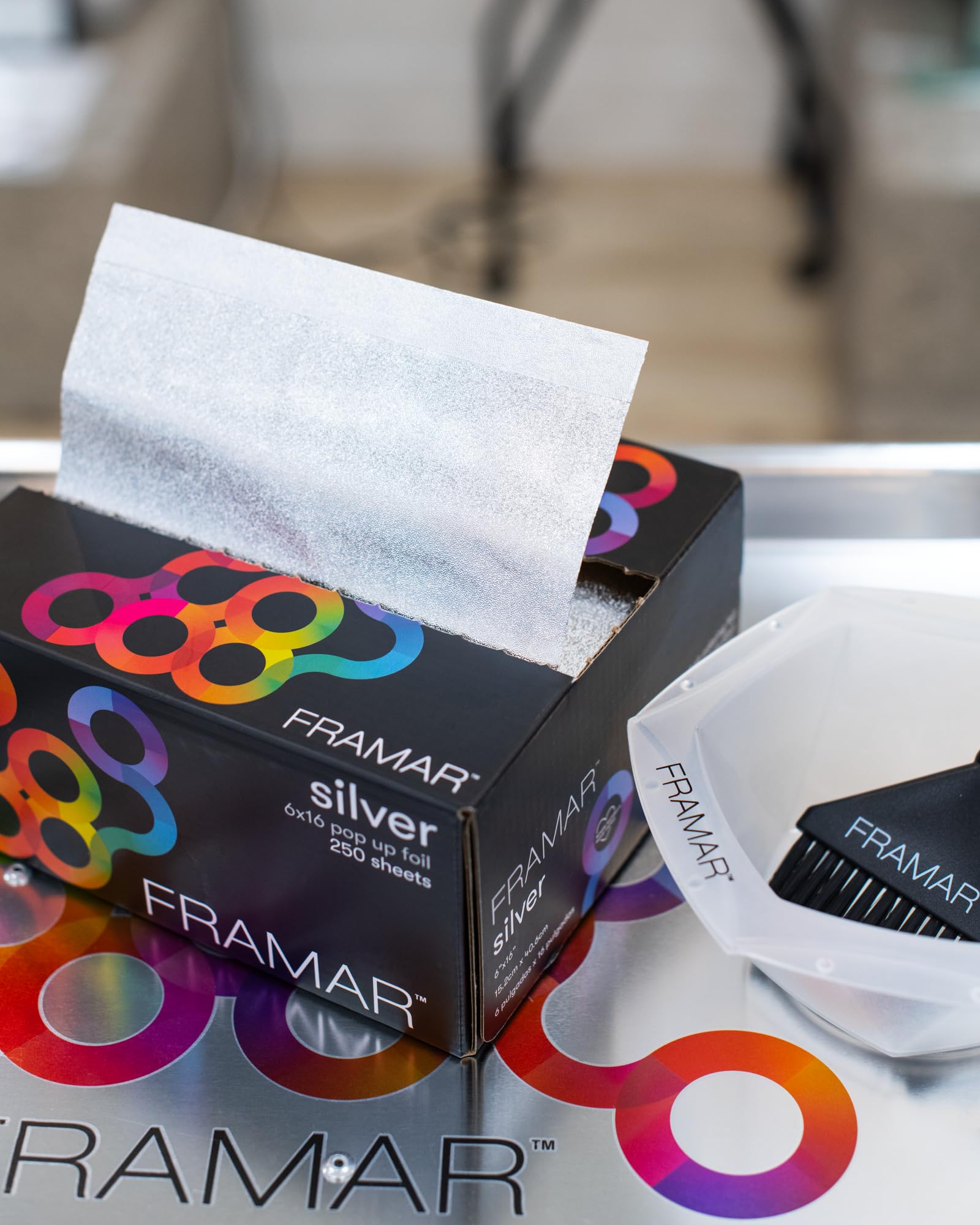 FRAMAR foil beside standard sheet showing larger 6x16 size advantage