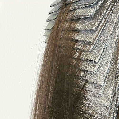 FRAMAR foil wrapped on long hair showcasing controlled sectioning
