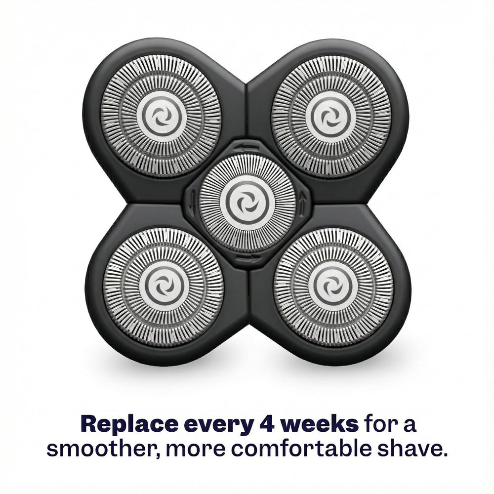 Freebird handheld shaver next to hand to show compact size and travel convenience