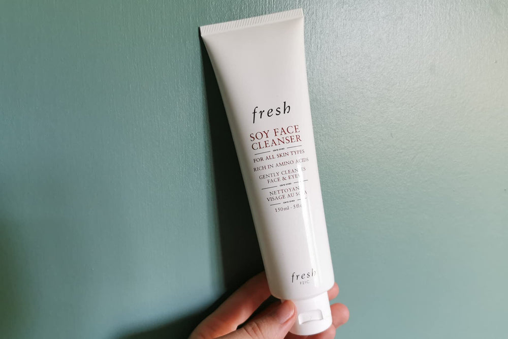 Label close-up on Fresh cleanser showing sealed 2021 batch code and authenticity reassurance