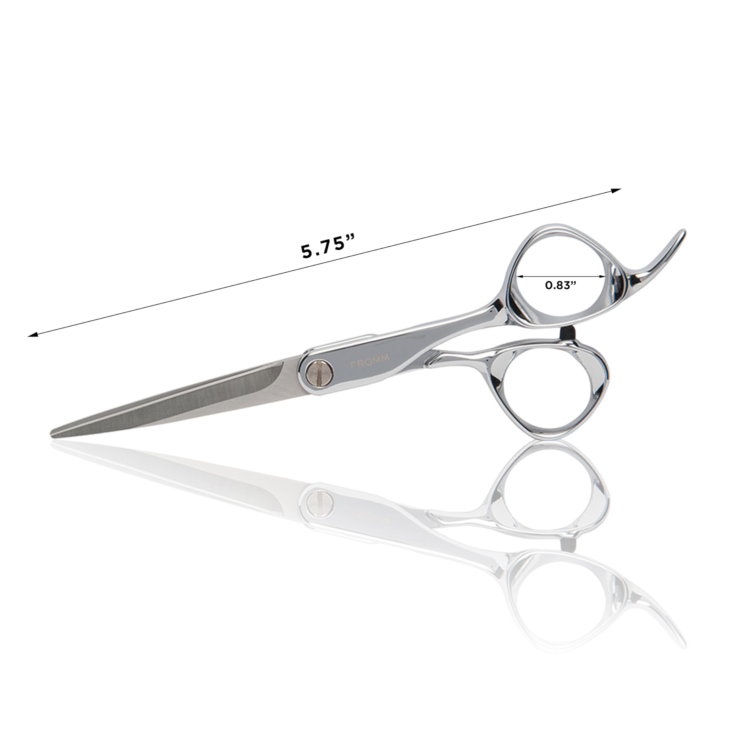 Fromm Explore next to ruler showing 5.75-inch scale for size and balance reference