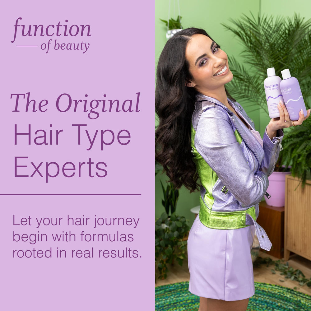 Function of Beauty bottles held in hand showing 22 oz scale and long-lasting size