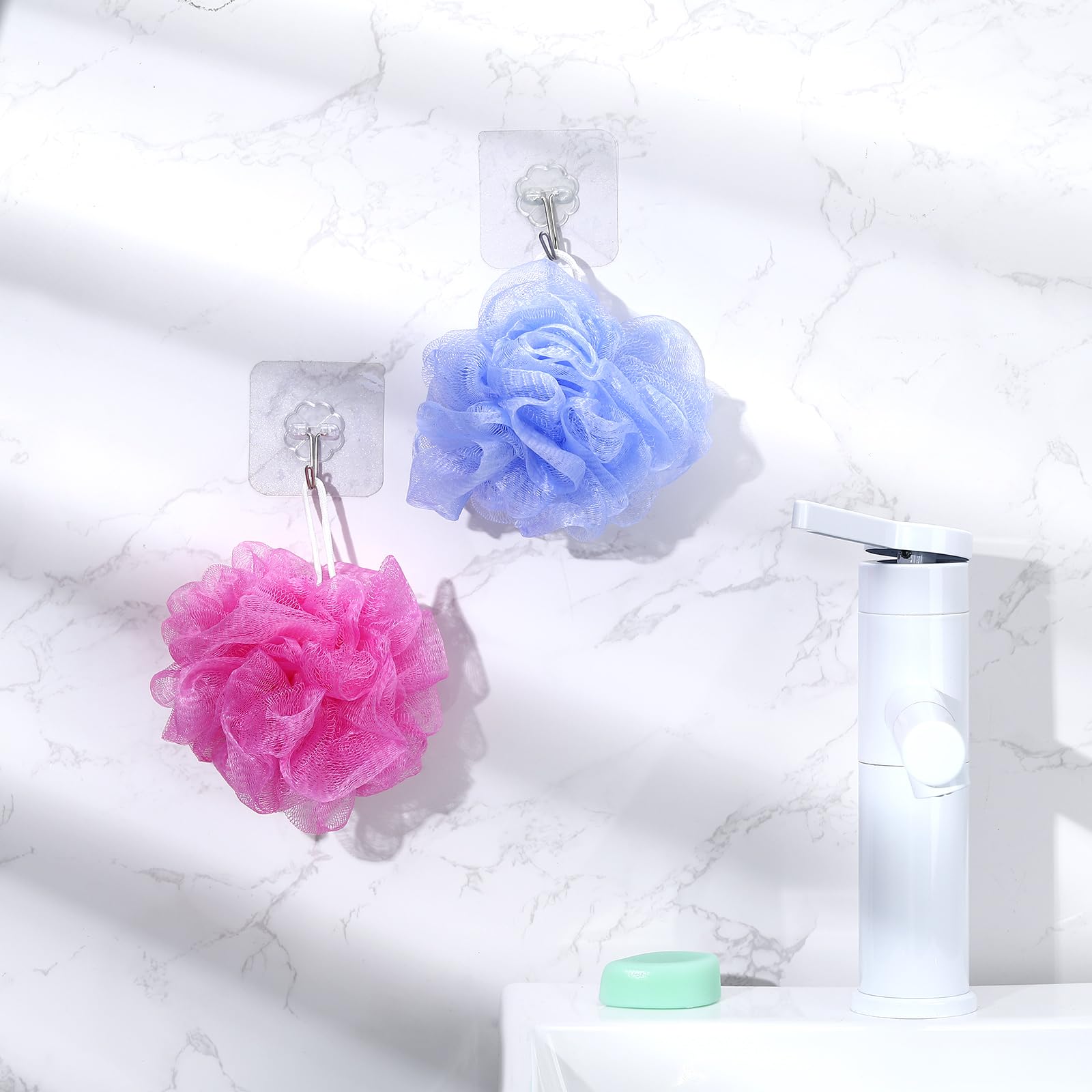 Funnymoom pastel loofahs displayed in bathroom for coordinated decor and convenience