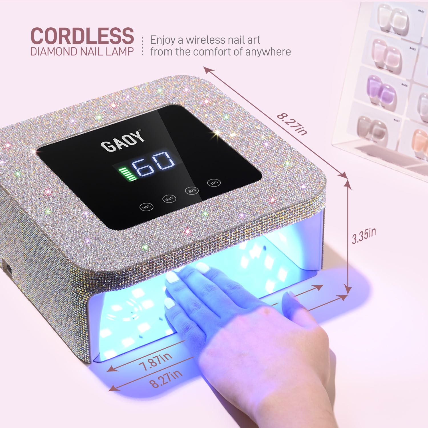 GAOY next to a hand for scale to highlight cordless portability and size