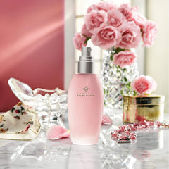 Garden Botanika Heart being sprayed on wrist demonstrating quick refreshing benefit