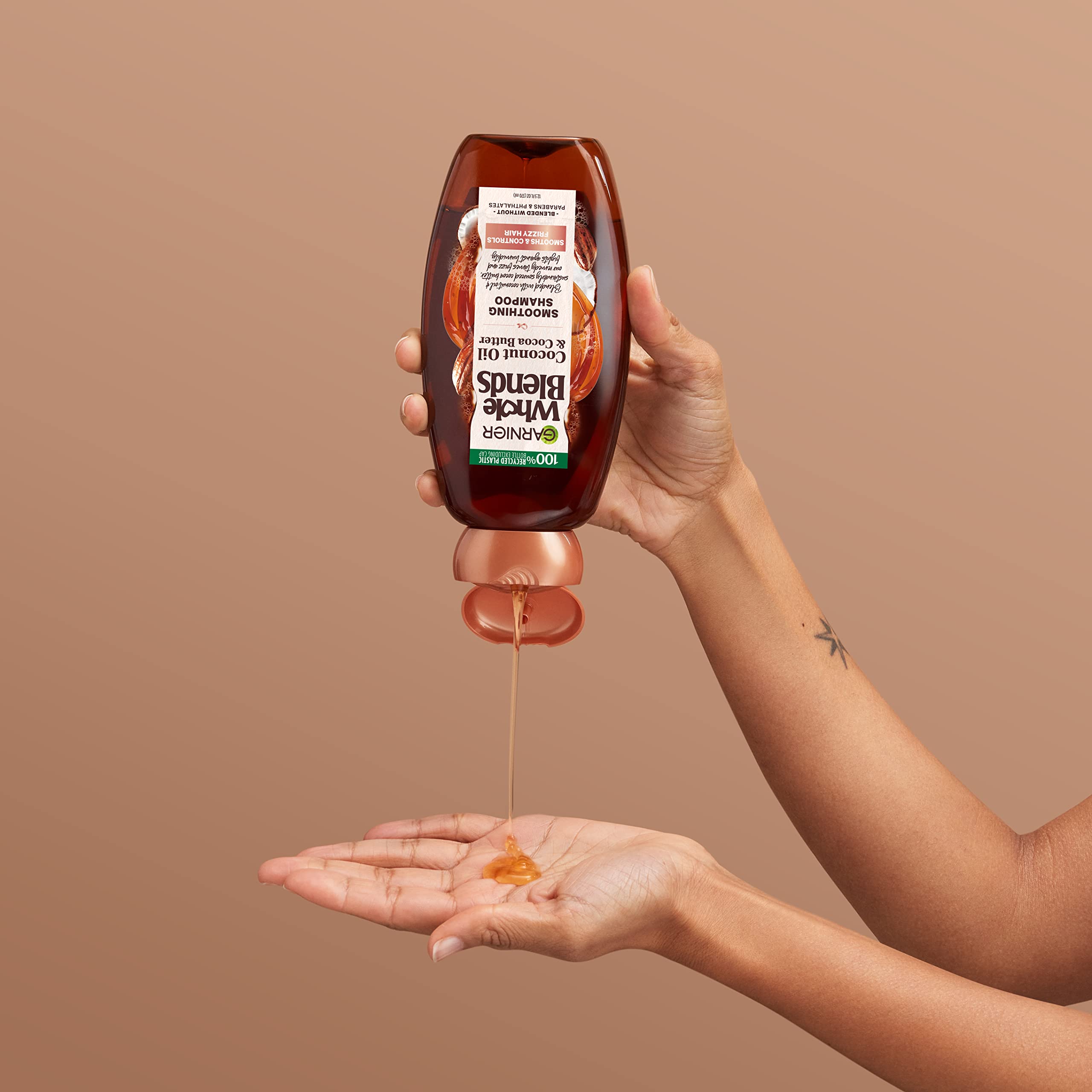 Garnier conditioner beside shampoo showing pairing for better smoothness