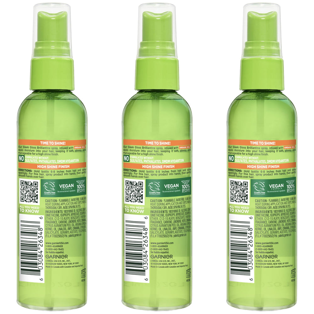 Model applying Garnier outdoors showing instant glossy, touchable finish benefit
