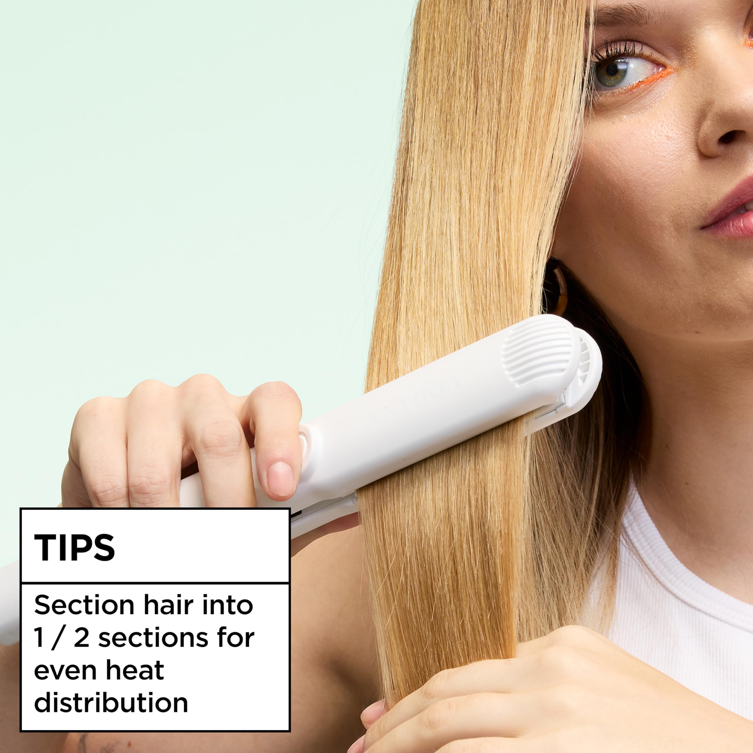 Garnier Fructis on bathroom shelf suggesting daily routine benefit