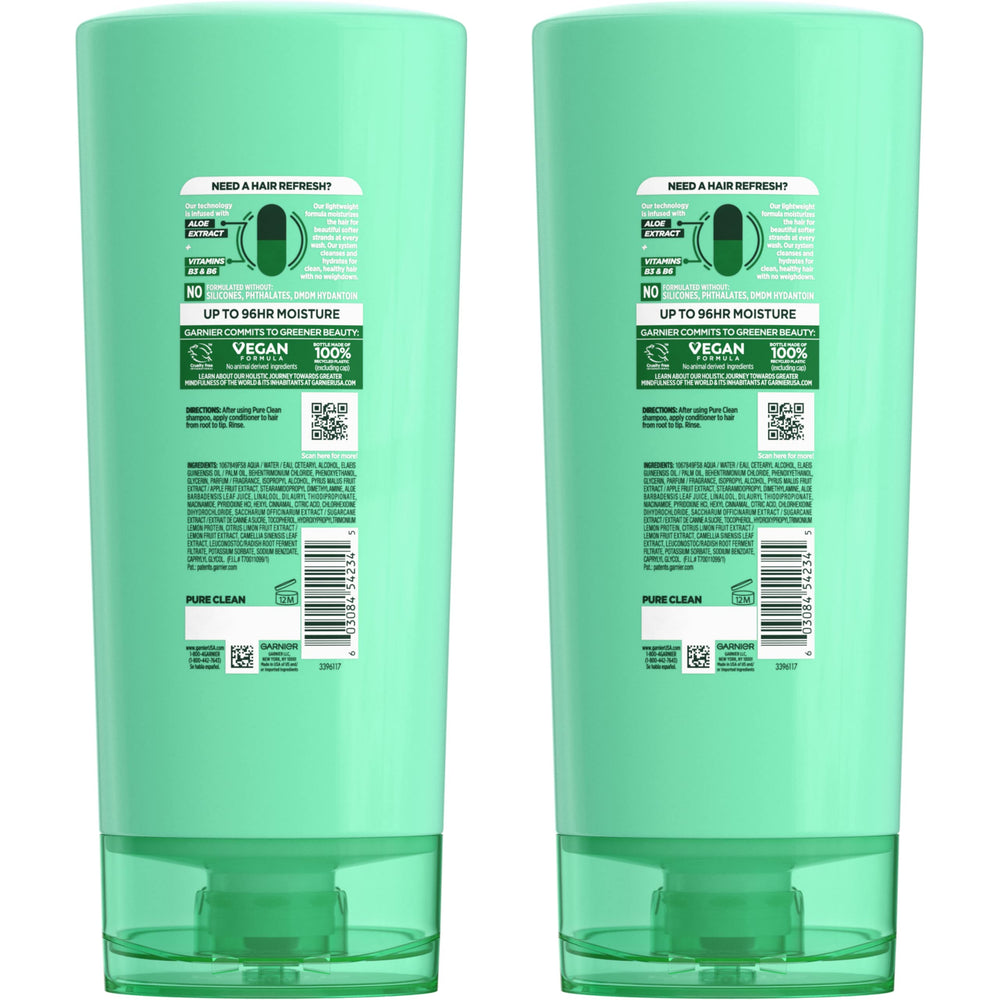 Garnier Fructis conditioner texture close-up demonstrating creamy hydration and slip