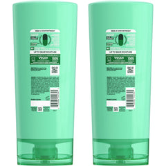 Garnier Fructis conditioner texture close-up demonstrating creamy hydration and slip