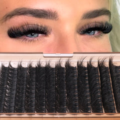Geeneiya close-up of matte-black cluster fibers showing natural mink-feel benefit