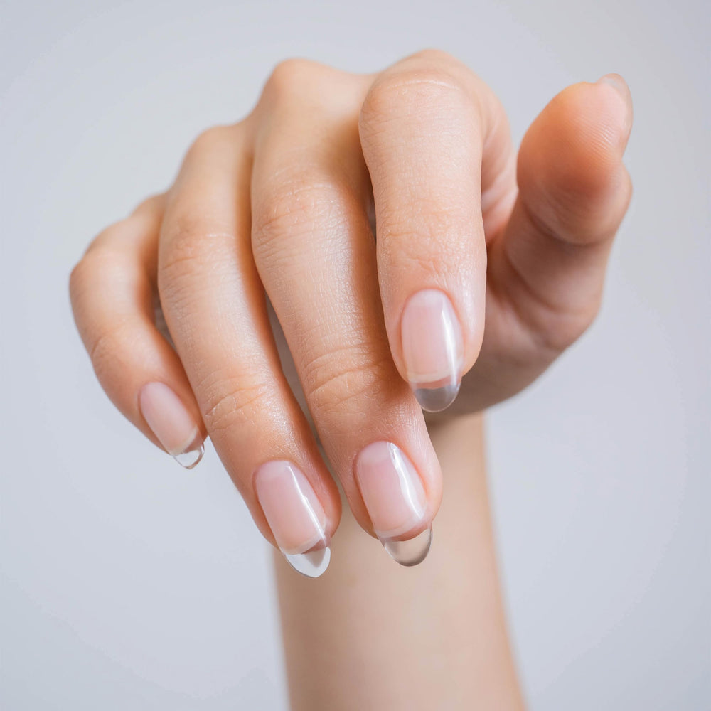 Gelish builder gel applied on nail extension in salon demonstrating strong, lightweight structure